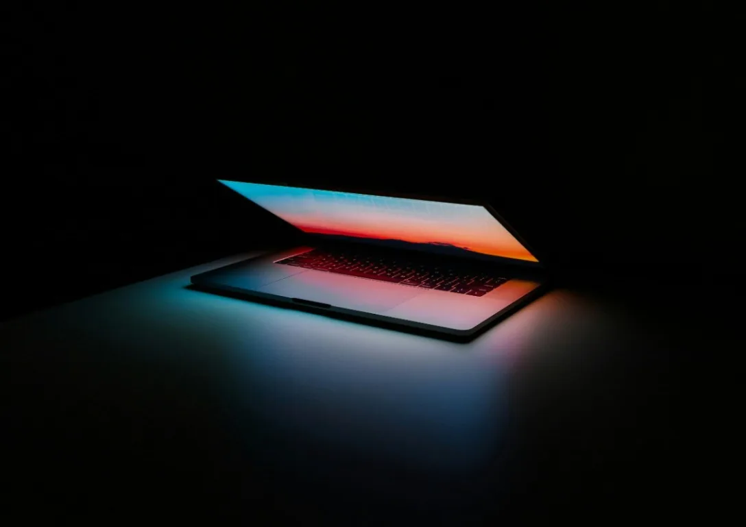 Laptop glowing in the dark